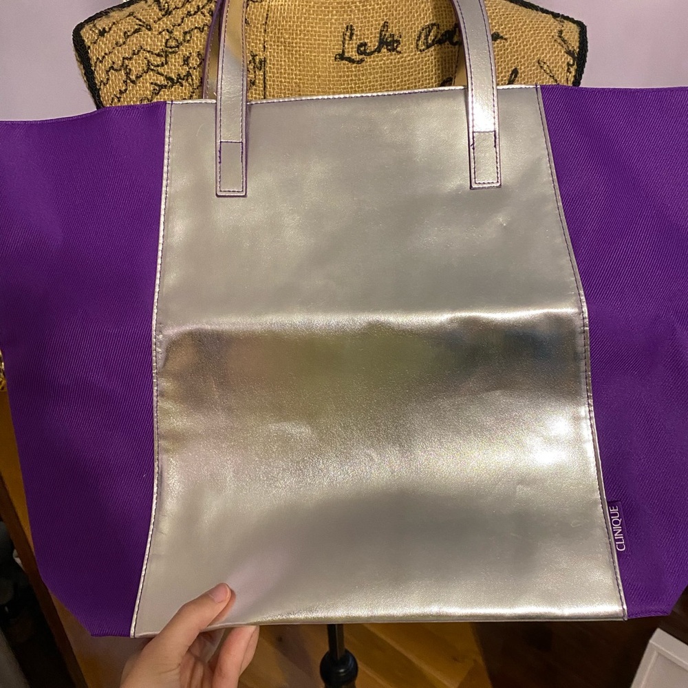 Purple and silver Clinique tote bag